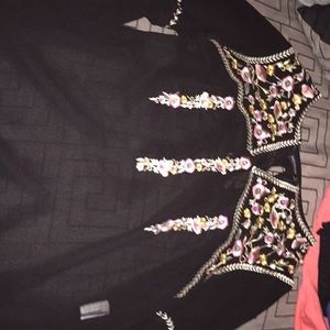 transparent , flowery pattern black shirt